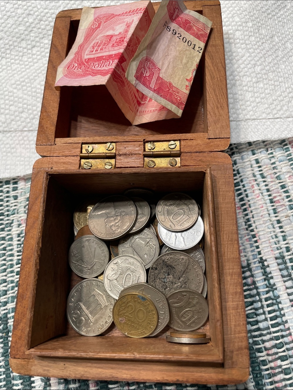 Wooden Trinket Box with Hinged Lid - Brown filled with foreign coins collectors